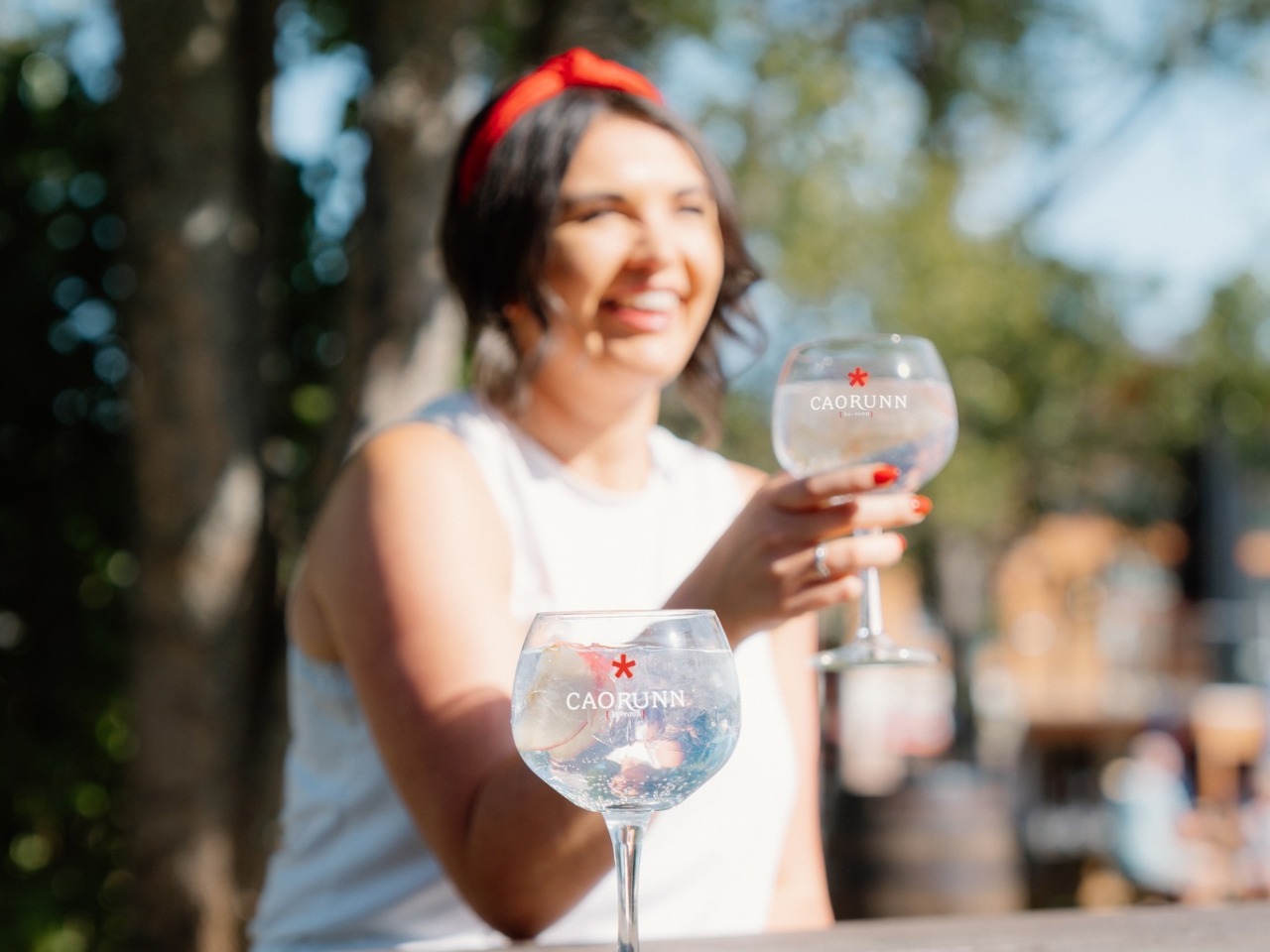 Instagram Julia Bryce holding caorunn copa glass 
